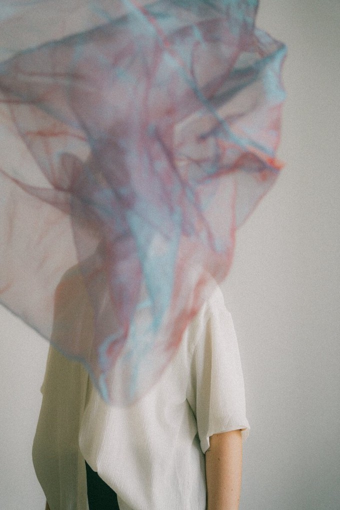 Blurry fabric to show the vibrational frequency of clothes