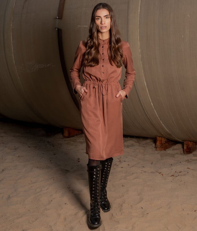 Consumer wearing a dress by an ethical hm alternative