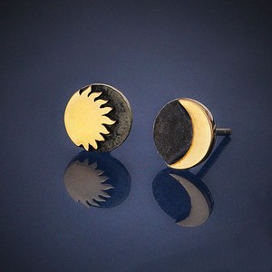 Zilveren oorbellen met bronzen zon en maan from Fairy Positron
