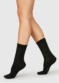 Chaussettes côtelées en coton bio noires via Olly