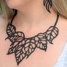 Monstera Leaf Upcycled Inner Tube Statement Necklace via Paguro Upcycle