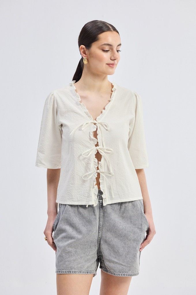 Relaxed Fit Top With Ruffles and Front-Ties in Cream from Reistor