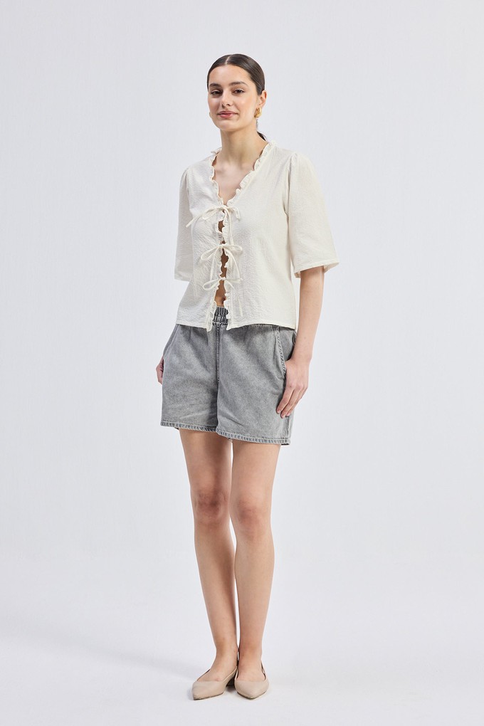 Relaxed Fit Top With Ruffles and Front-Ties in Cream from Reistor