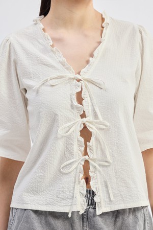 Relaxed Fit Top With Ruffles and Front-Ties in Cream from Reistor