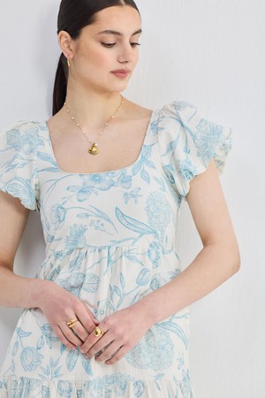 Puff Sleeve Tiered Maxi Dress in Blue Florals from Reistor