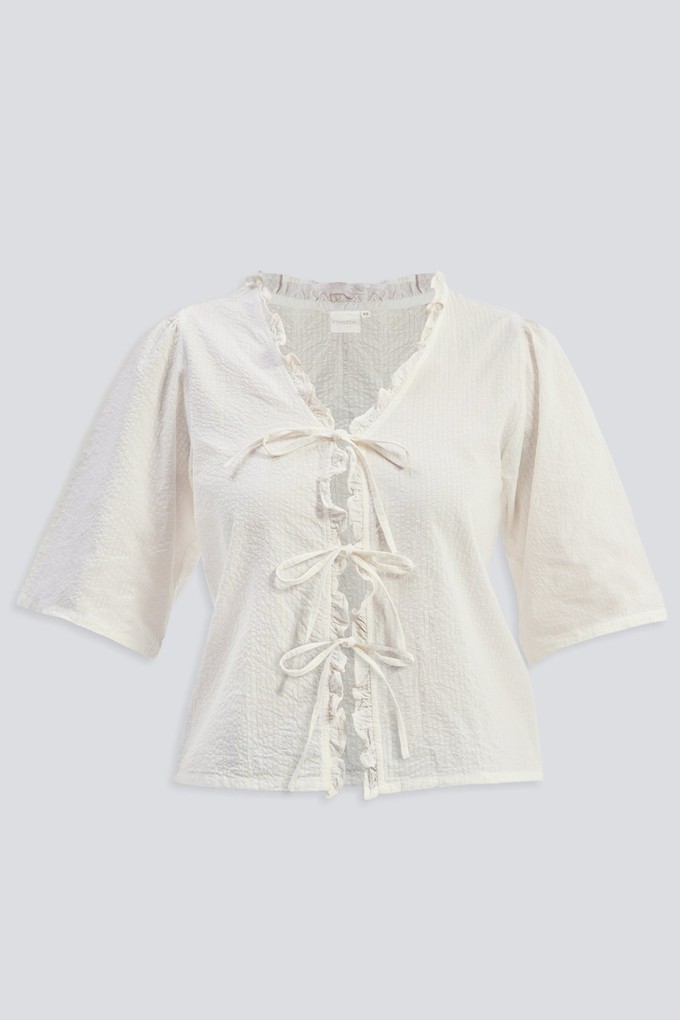 Relaxed Fit Top With Ruffles and Front-Ties in Cream from Reistor