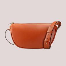 Halfmoon bag Terracotta via The Manda